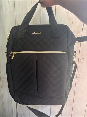 Stylish Quilted Black Backpack with Gold Hardware